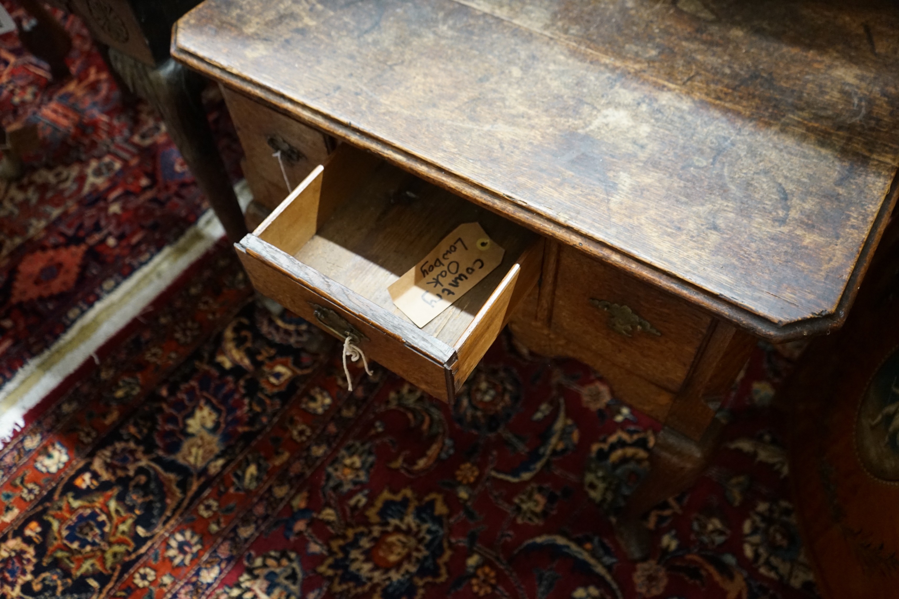 An 18th century provincial oak lowboy, length 73cm, depth 46cm, height 66cm